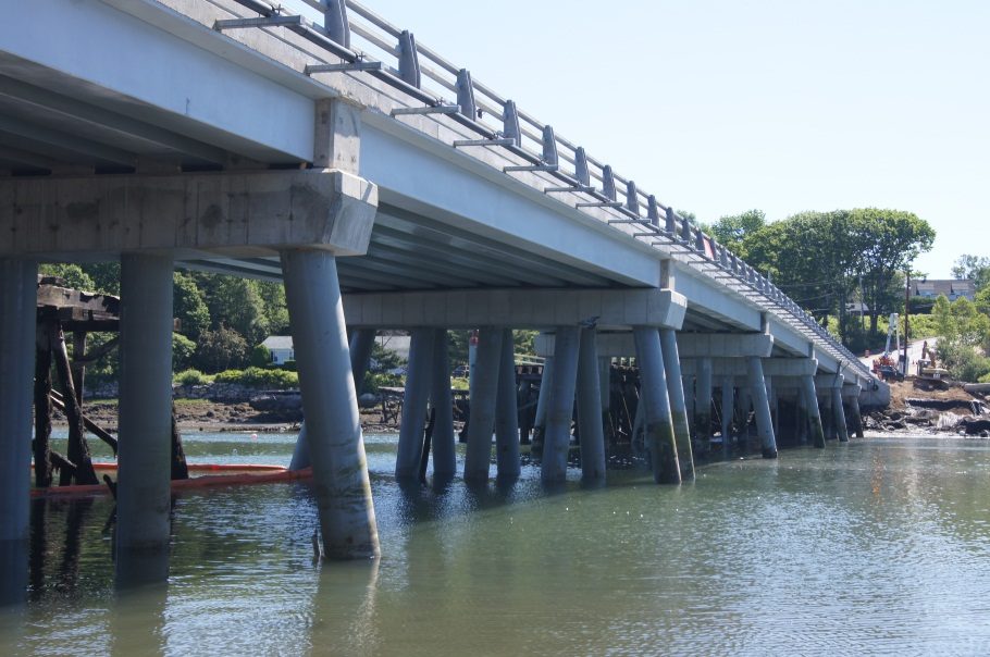 Composite bridge beam installed as a highway bridge structure